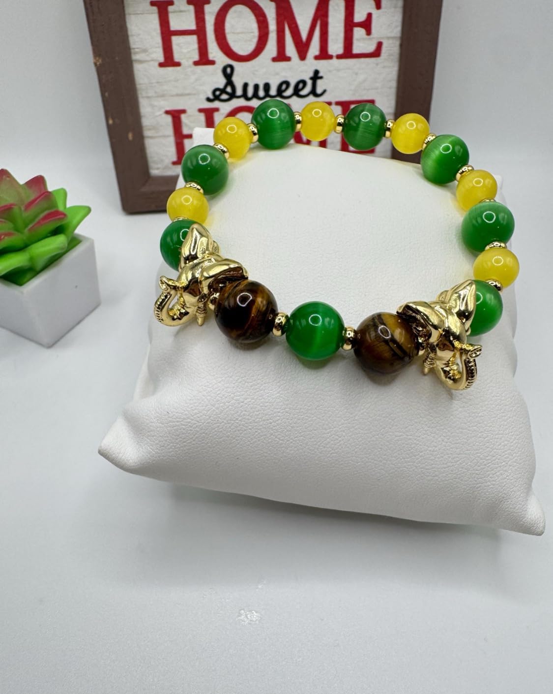 Ilde de Orula.| Idde de Orula.| Ilde de Orula con Cristal de ojo de Gato y Ojo de Tigre. | Gold Plated.| 7 pulgadas de ancho