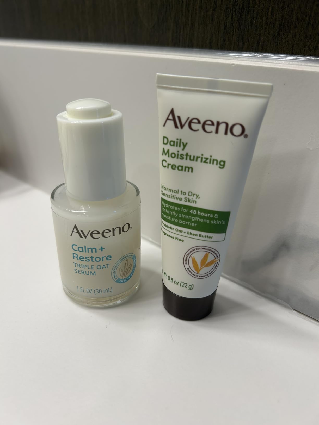 Kenvue Aveeno Skin-Care Bundle for Sensitive Skin, Calm + Restore Triple Oat Hydrating Facial Serum, 1 fl. oz, & Travel Size Daily Moisturizing Cream + Prebiotic Oat, 0.5 oz, Fragrance Free, Two Items