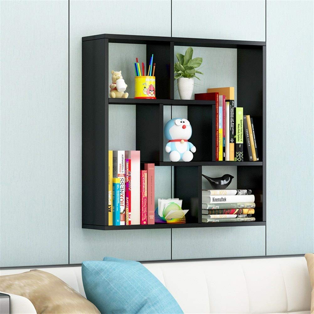 Étagère murale simple noire pour créer un coin lecture cosy dans le salon