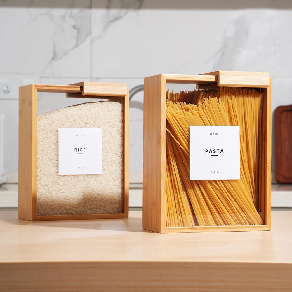 The APT 1101 Food Dispenser tilted, showing rice being dispensed from its large mouth opening into a glass bowl.