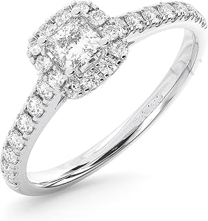 Helt ny 0,65 ct rund briljant och prinsessslipade diamanter halo förlovningsring i guld och platina märkt av Assay Office London. e 18 karat vitt guld, K, cod. FR01102