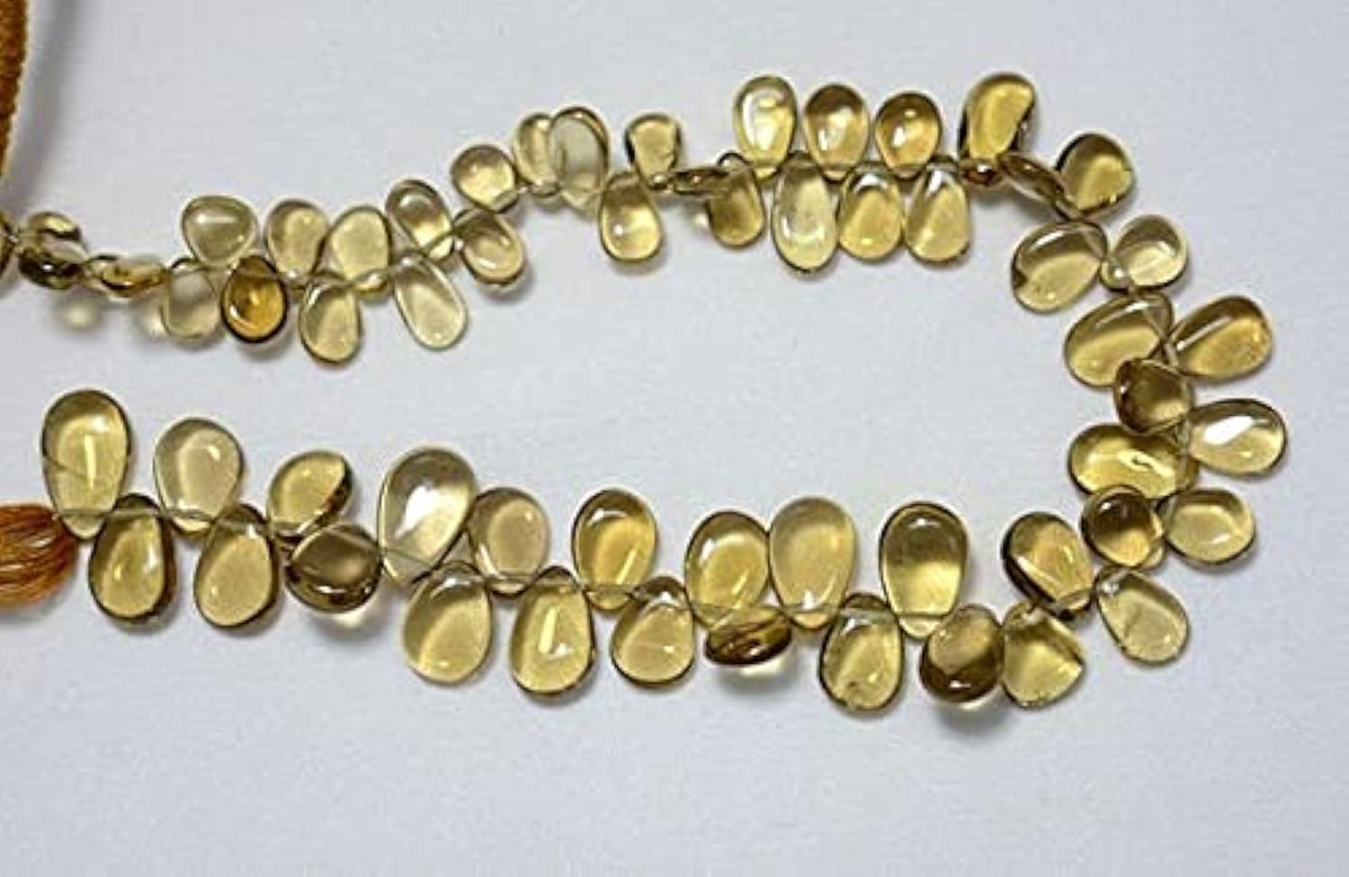 Perles quartz citron forme poire pour en finir avec les bijoux ternes