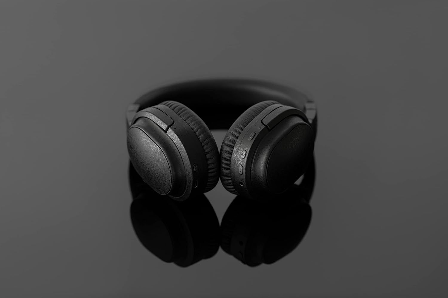 Final UX3000 headphones connected via 3.5mm cable to a portable music player