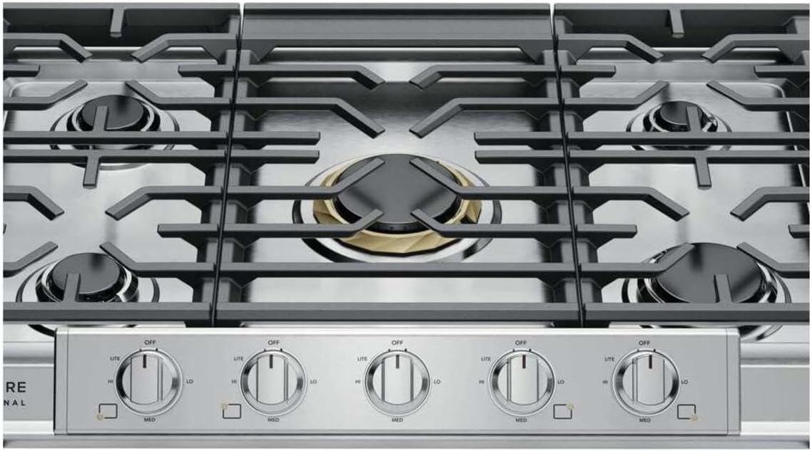 Close-up of the cast iron grates and burners on the cooktop