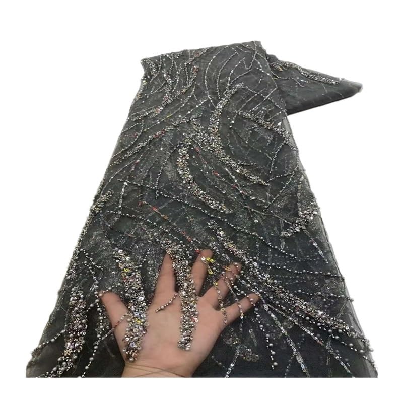 Tissu à paillettes noir pour réparer ou confectionner une robe de mariée sur mesure