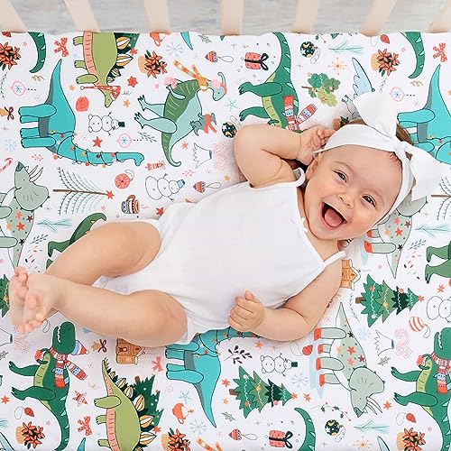 Image of JISEN Baby Crib Sheet 1 Piece Portable Fitted Crib Sheet for Standard Crib and Toddler Mattresses Nursery Bed Decor for Boys Girls 28x52 Christmas Dinosaurs