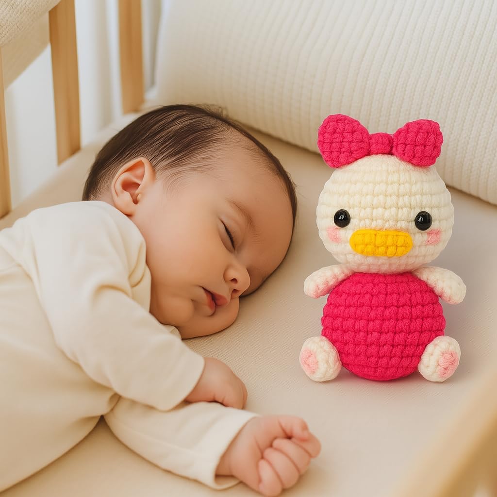 Sutra Handmade Crochet Duck with Pink Bow – Cute Amigurumi Animal Décor, Soft Yarn Collectible
