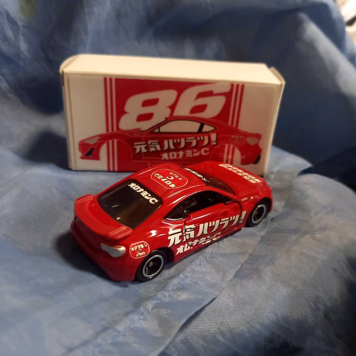 Amazon | トミカ ミニカー86 カーラ 特注 元気ハツラツ オロナミンC