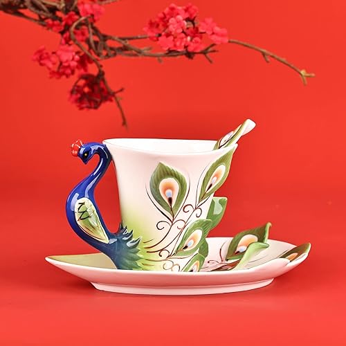 Miniatura 4 de oliruim Juego de taza de té de cerámica de pavo real única hecha a mano taza de té y platillo con cuchara 1 juego de exquisito juego de porcelana
