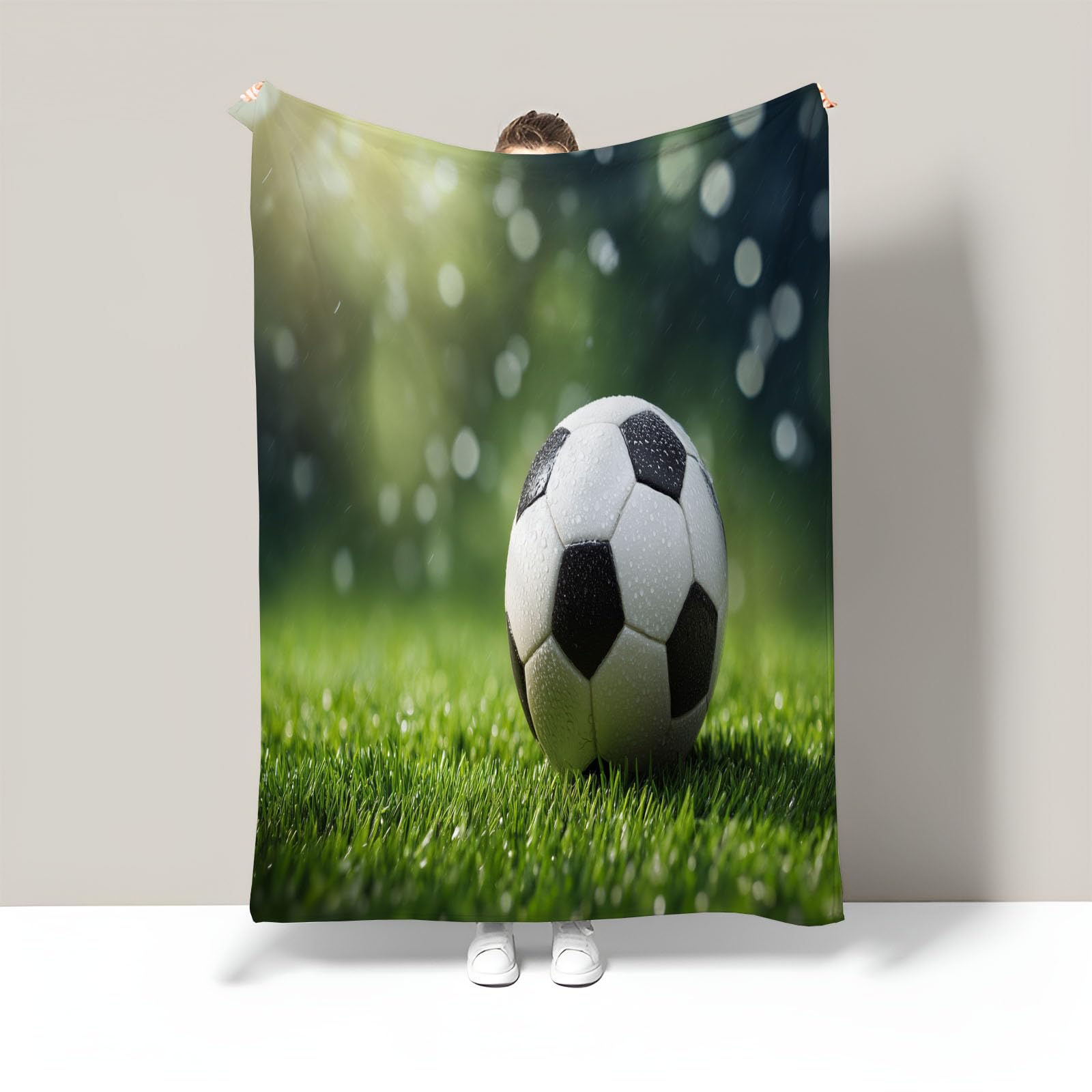 Couverture en flanelle football pour un moment cocooning devant le match sur le canapé