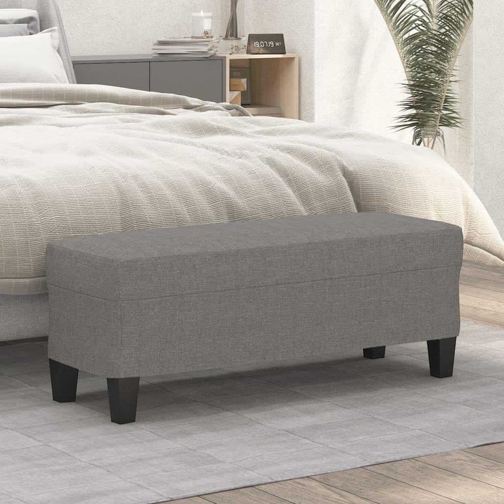 Banc de coffre gris foncé en tissu capitonné pour optimiser le rangement du salon