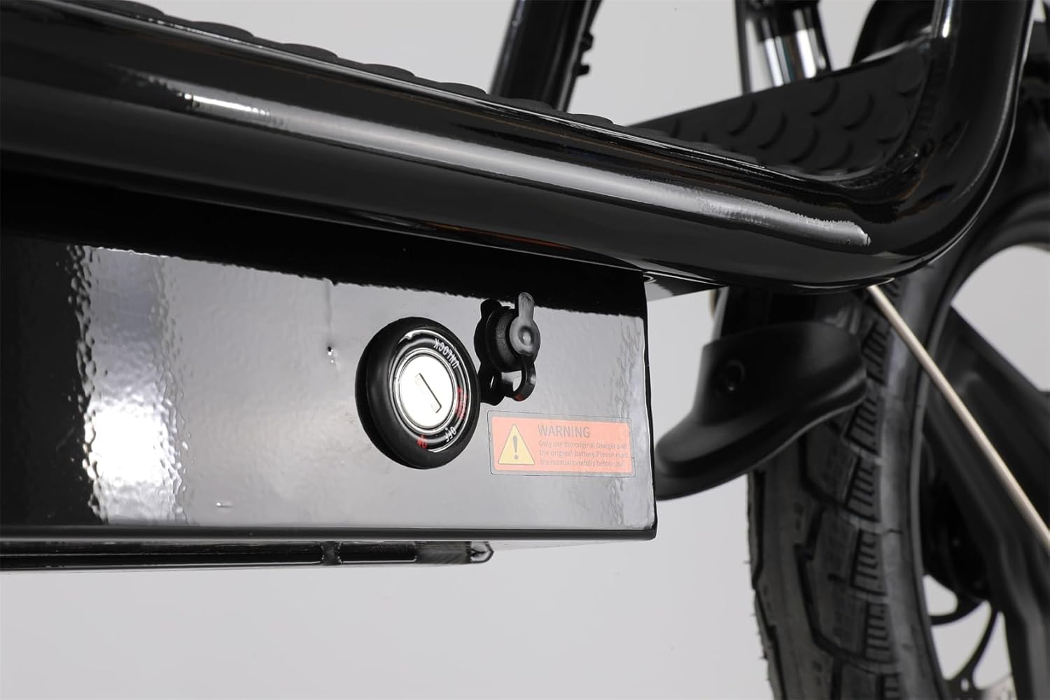 Close-up of Caroma K5 battery lock and charging port