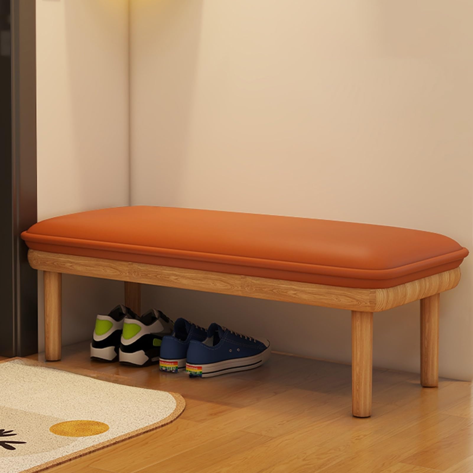 Banc à chaussures orange pour entrée accueillante : fini le désordre au quotidien