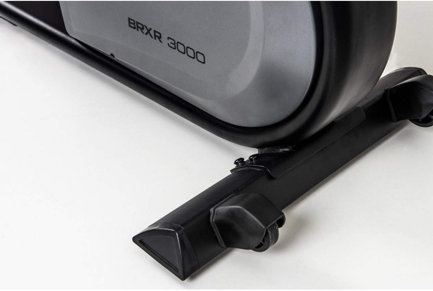 Close-up of the Toorx BRX-R3000's rear stabilizer with transport wheels