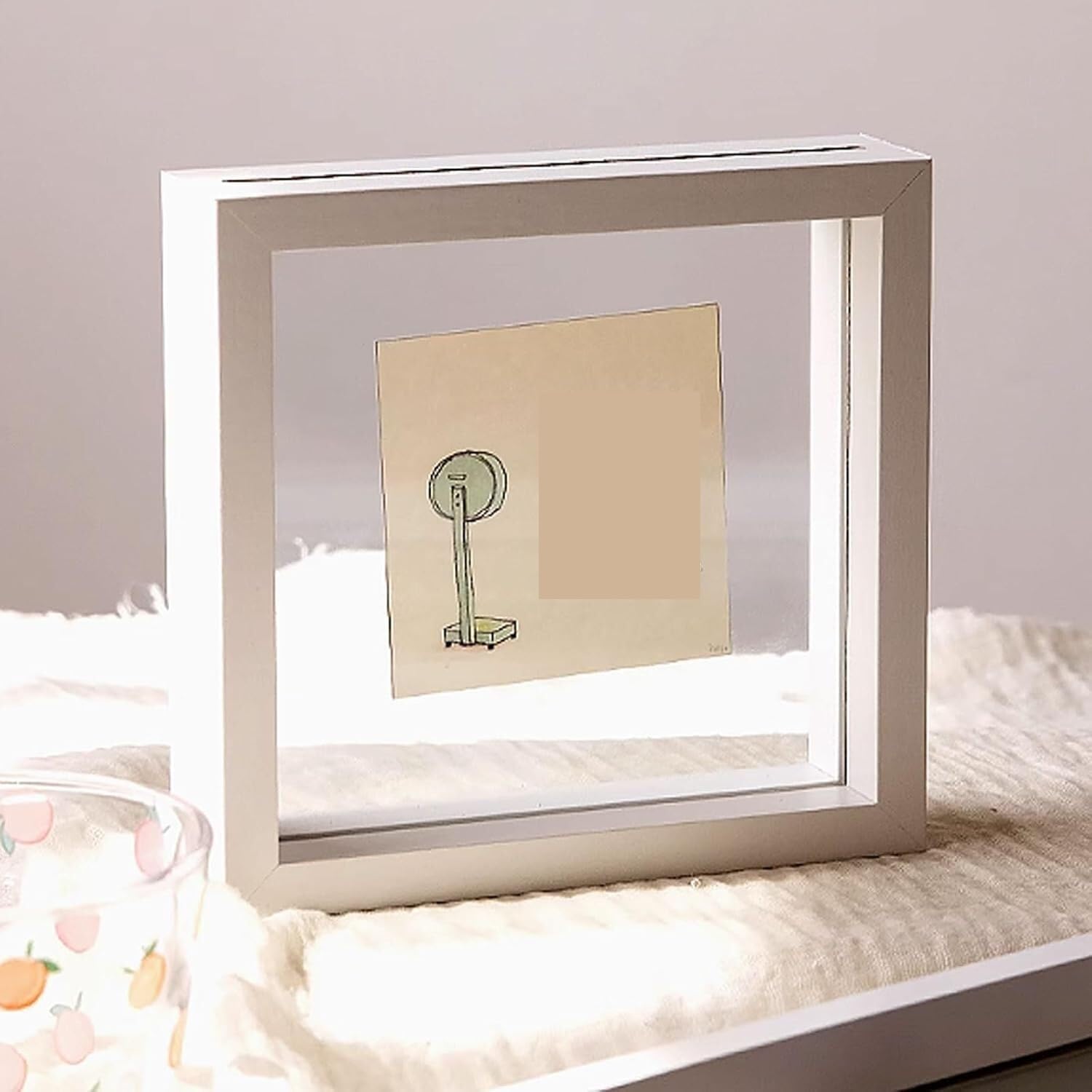 Cadre photo en verre double face transparent et design épuré