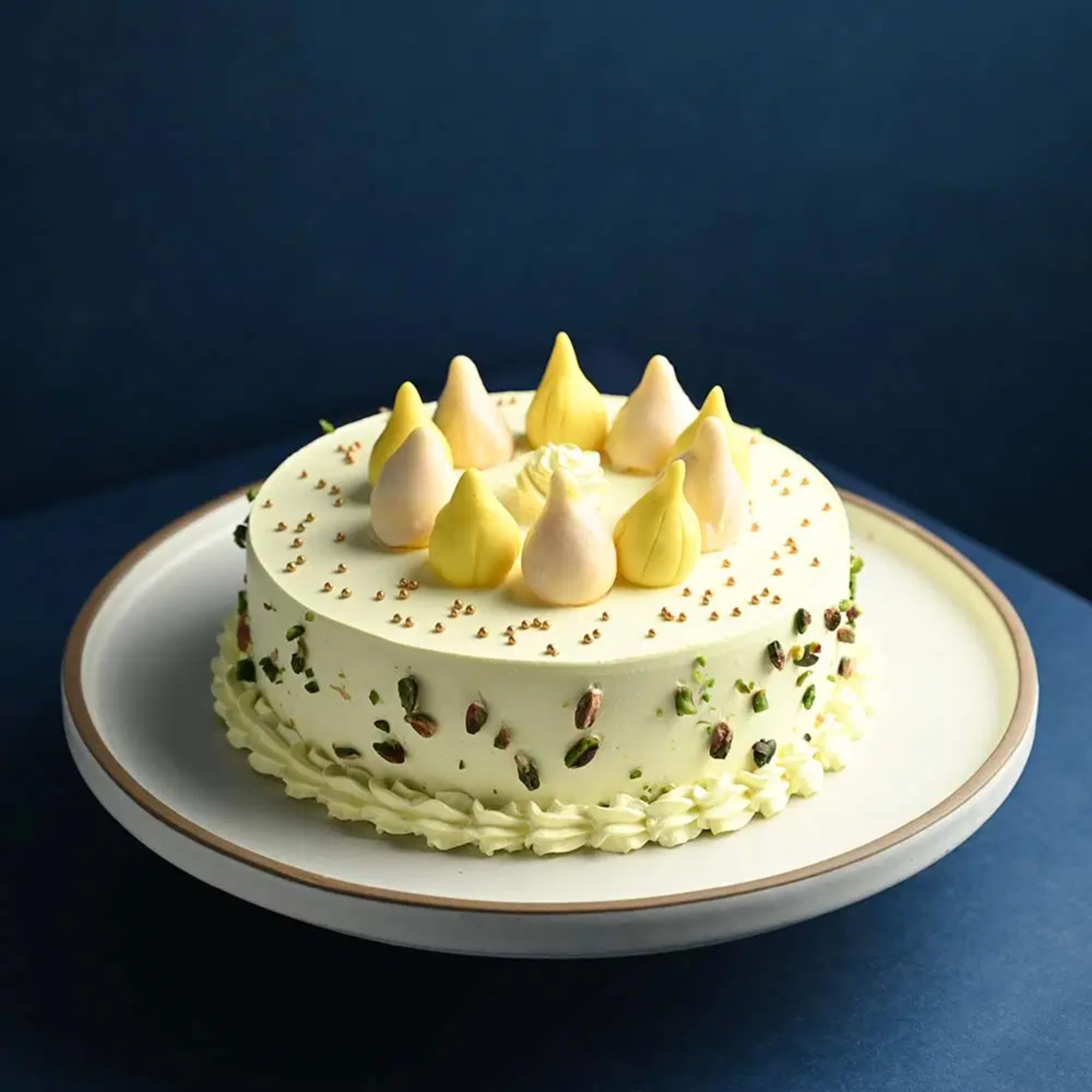 Bakingo 500g Delicious Silky Smooth Fresh Pistachio Coated Butterscotch Modak Cake For Birthday & Anniversary Cake, Valentine Day Cake, Ganesh Chaturthi Cake, Diwali Cake (Same Day Delivery)-image-10