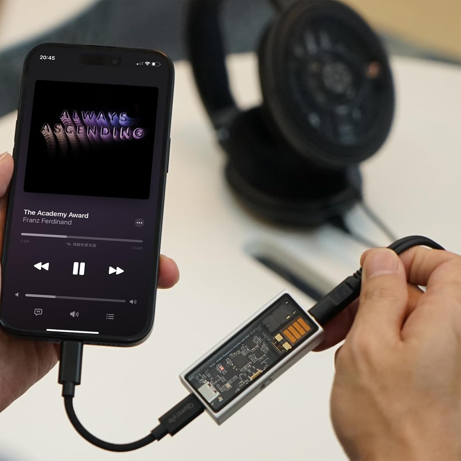Questyle M15C connected to a smartphone playing music