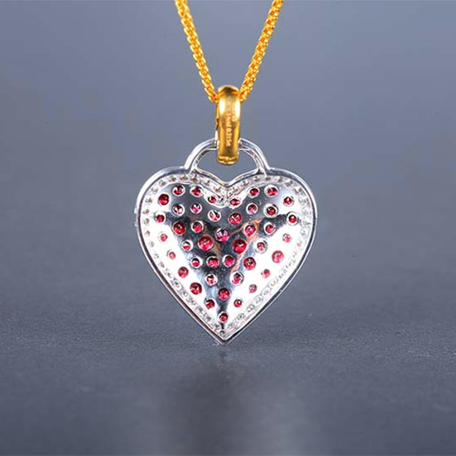 Colgante de corazón bicolor 375 585 750 con rubí 1,1 ct