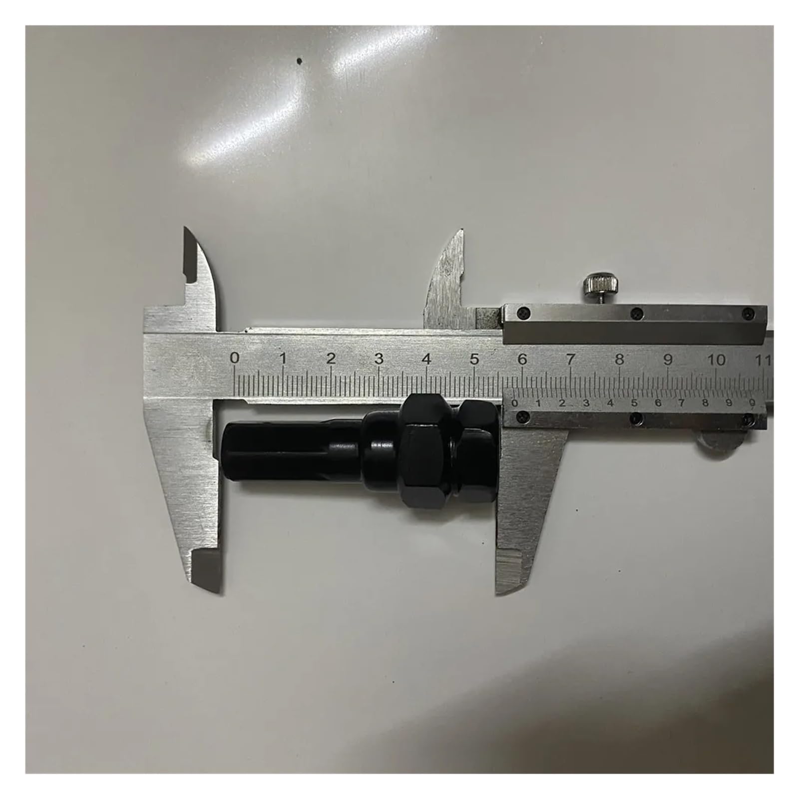 21 szt. 3 cm nakrętek kół samochodowych M12x1,25, M12x1,5 (20 szt. nakrętek kół + 1 narzędzie do strojenia) Czarne nakrętki kół M12x1,5 kuta stal(M12x1.5)