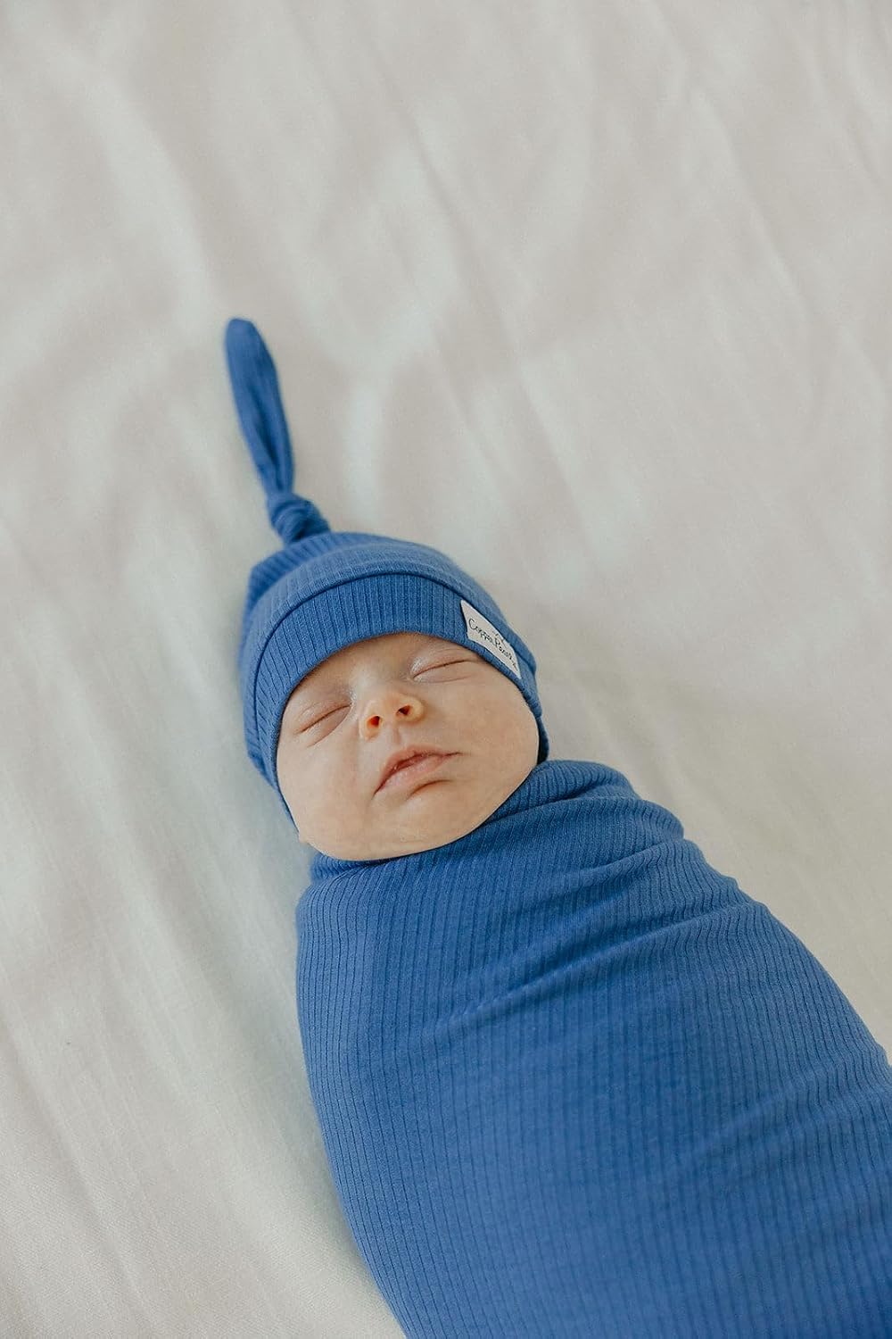 Copper Pearl Baby Beanie Hat Top Knot Stretchy Soft Indigo