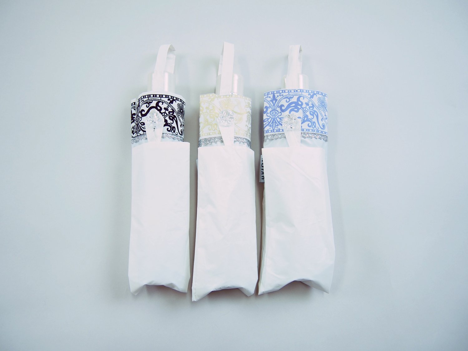 Amazon.co.jp: UVION(ユビオン) ホワイト 折りたたみ傘 手開き