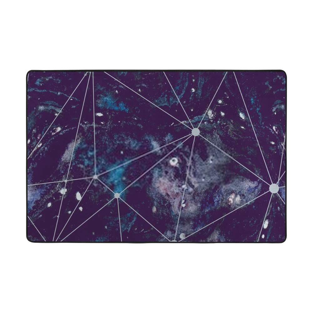 Tapis de salon géométrique grand format idéal pour une chambre d'ado sur le thème espace