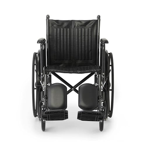 Miniatura 4 de Medline K1 Silla de ruedas básica de vinilo con brazos de longitud completa y reposapiernas elevadores, asiento de 18 pulgadas de ancho, color negro