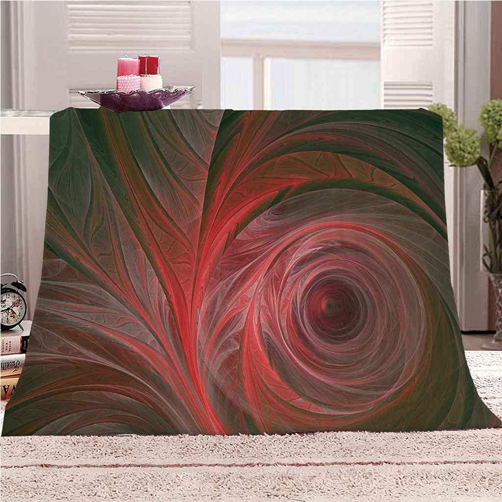 Couverture polaire rouge art spirale idéale pour vos soirées canapé cocooning en hiver