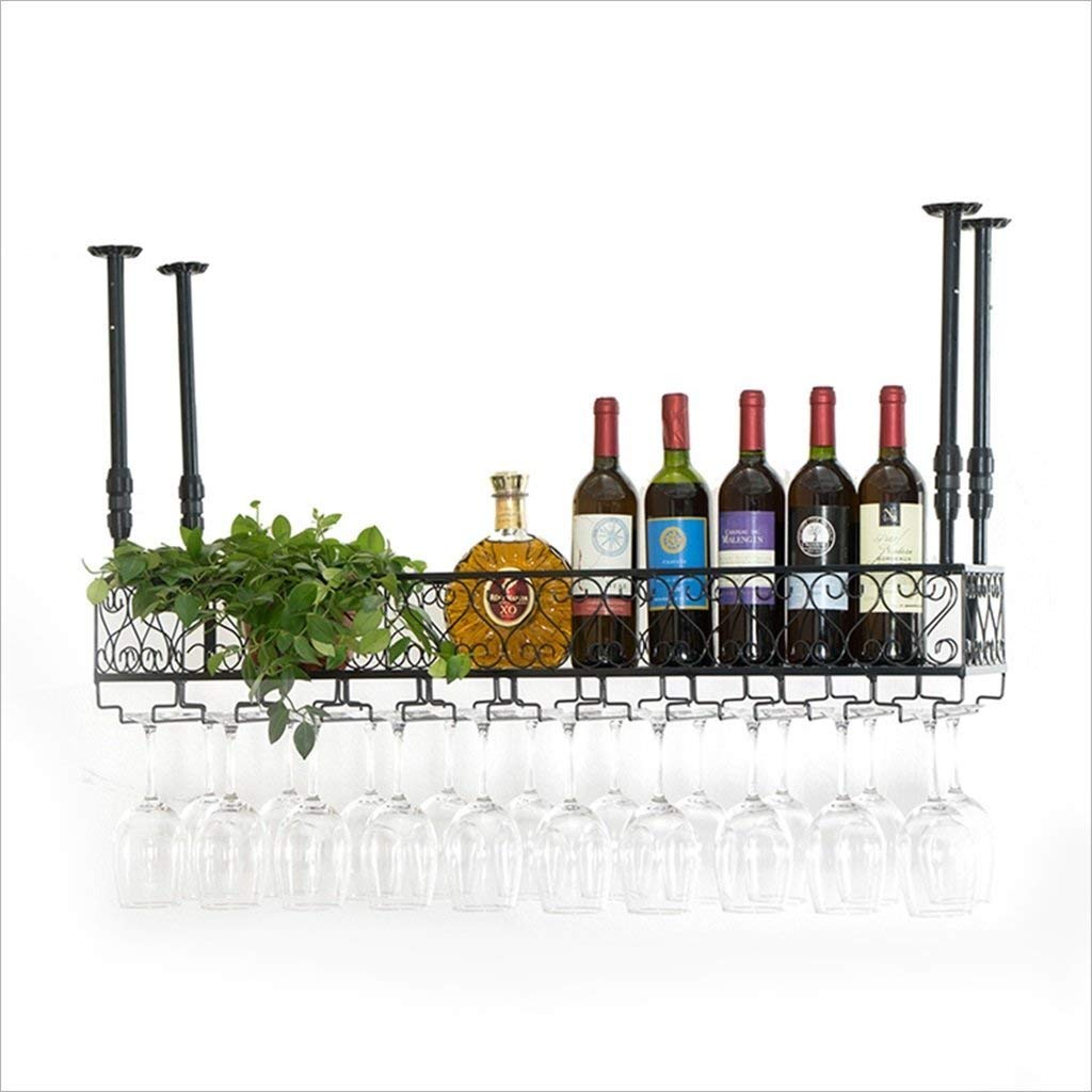 Estante para vino en restaurante y hogar que organiza botellas y copas altas
