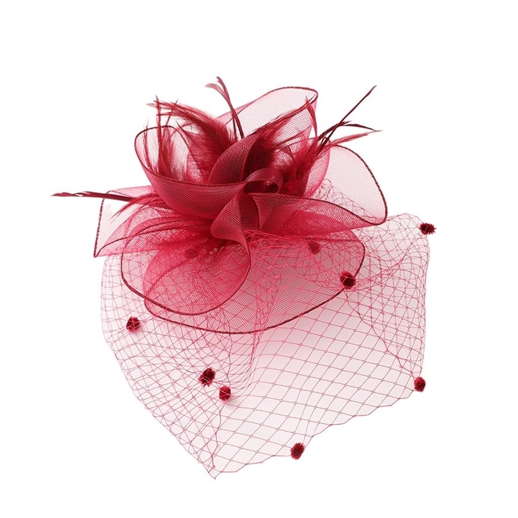 Accessoires cheveux plume et voile pour coiffure de mariée vintage