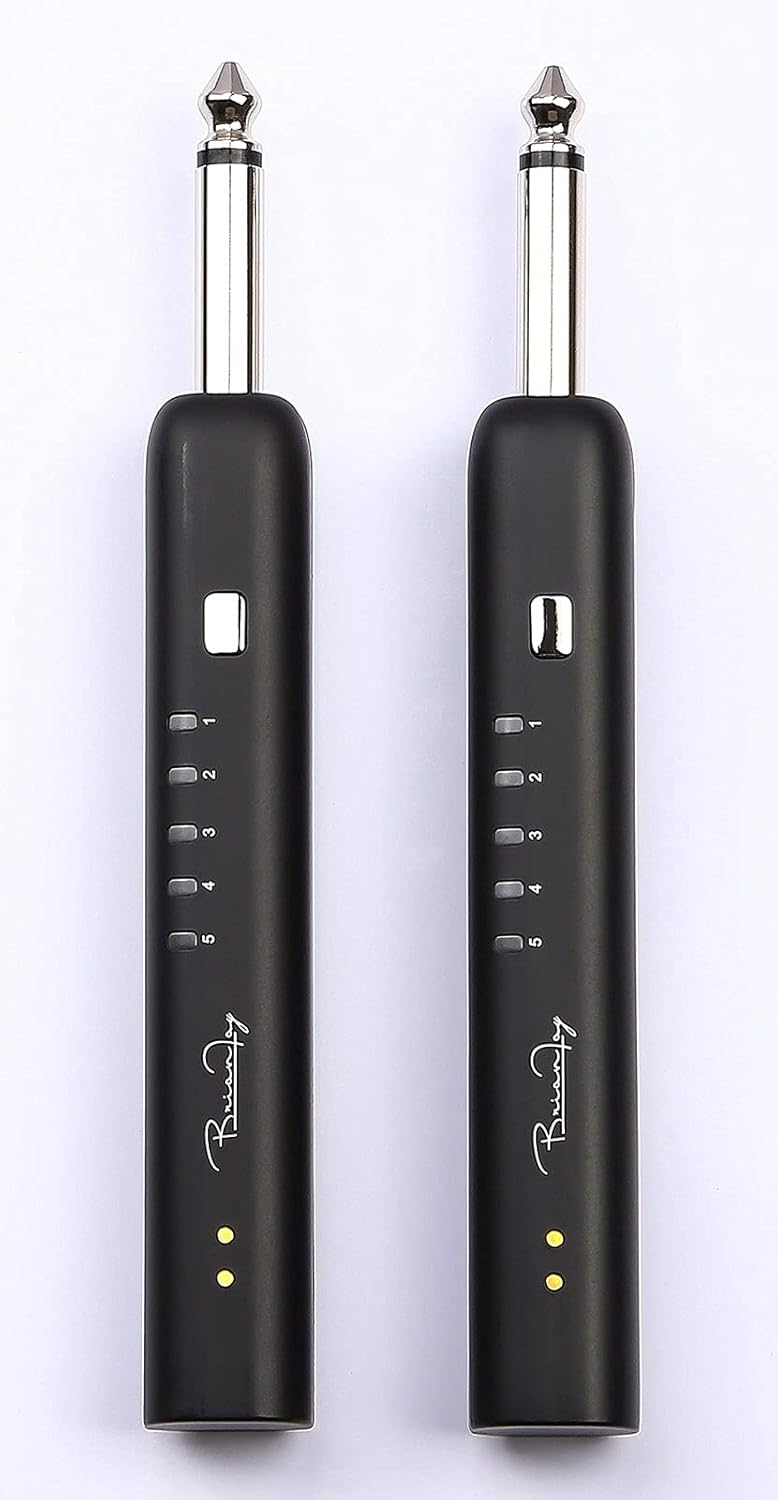 Close-up of transmitter and receiver units showing channel indicator lights