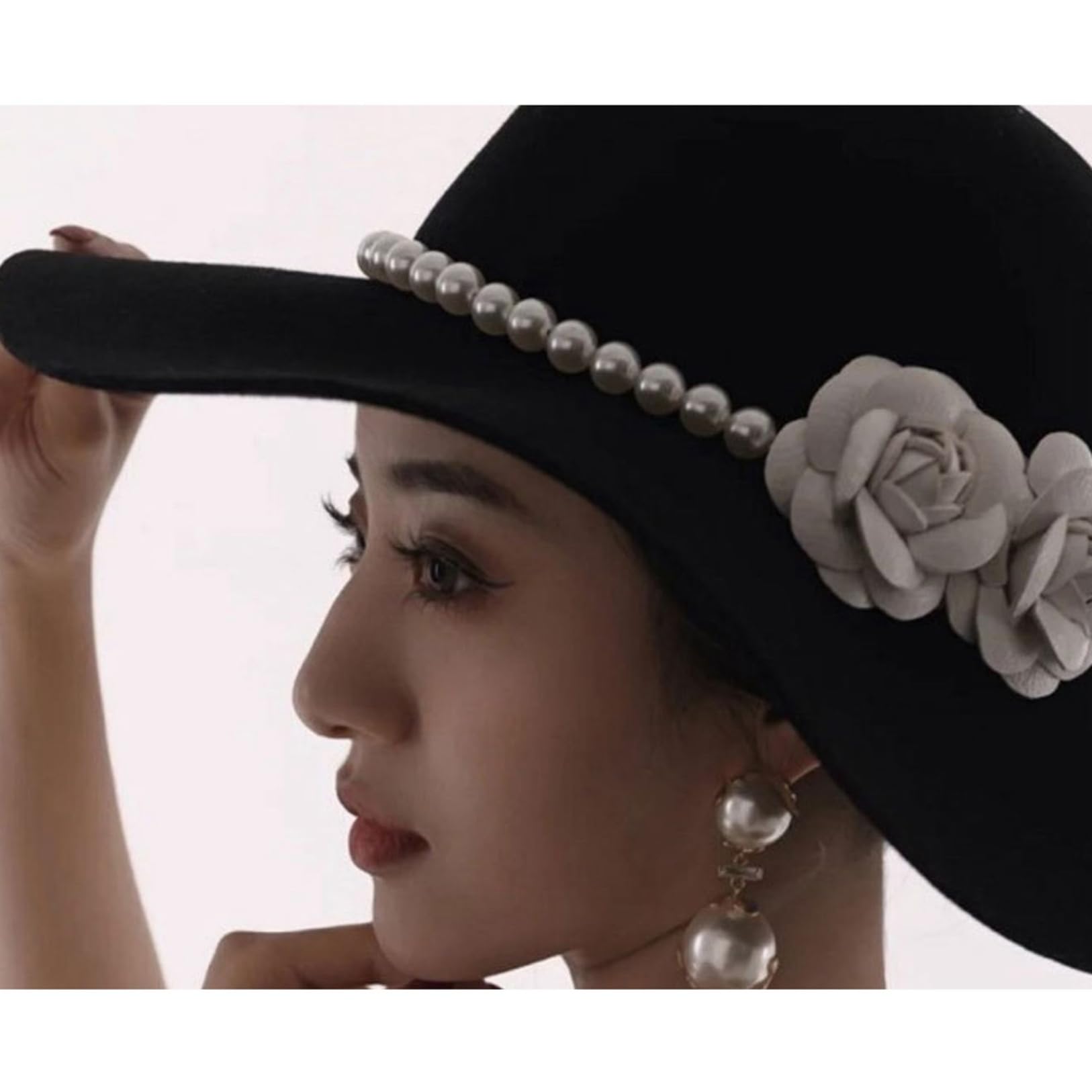 イノセントワールド 黒い花飾り付き広つばハット