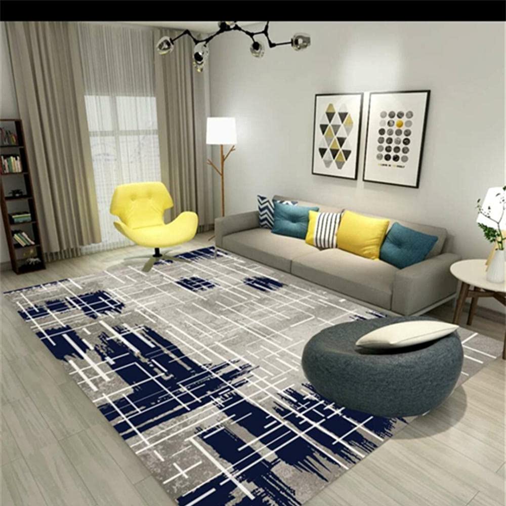 Décoration maison de standing avec ce tapis abstrait bleu et gris