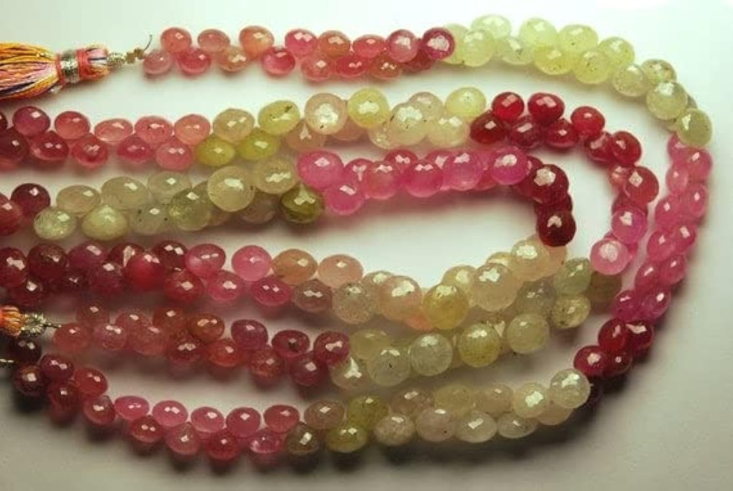 Saphir d'Umba briolette oignon 7-5mm pour montage de boucles d'oreilles