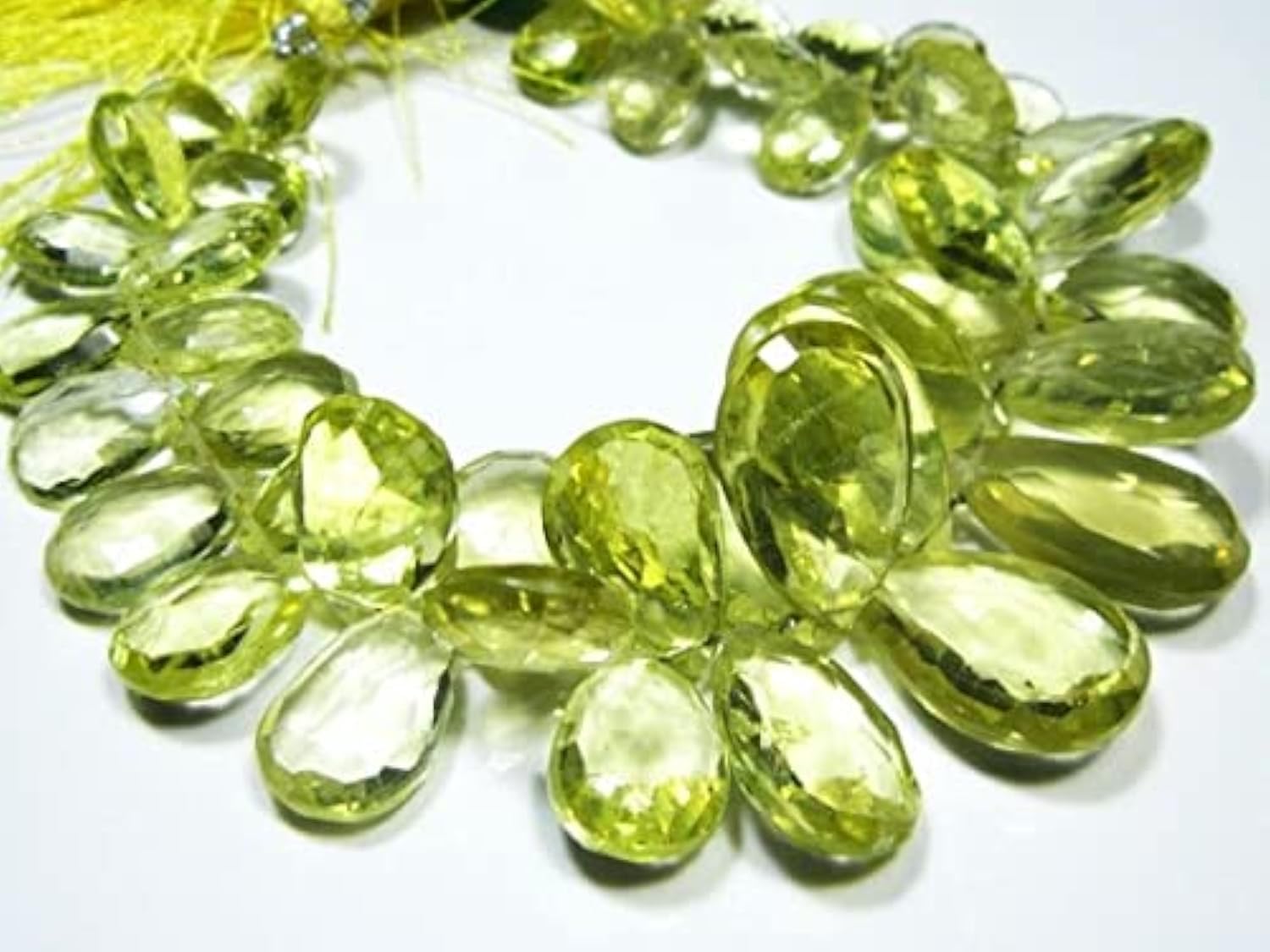 Quartz Citron authentique en grandes briolettes poire pour offrir un bijou unique