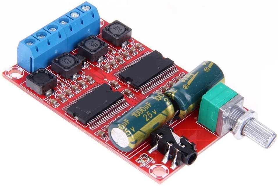 Angled view of the amplifier board showing the 3.5mm input, volume knob, and blue screw terminals for power and speakers.