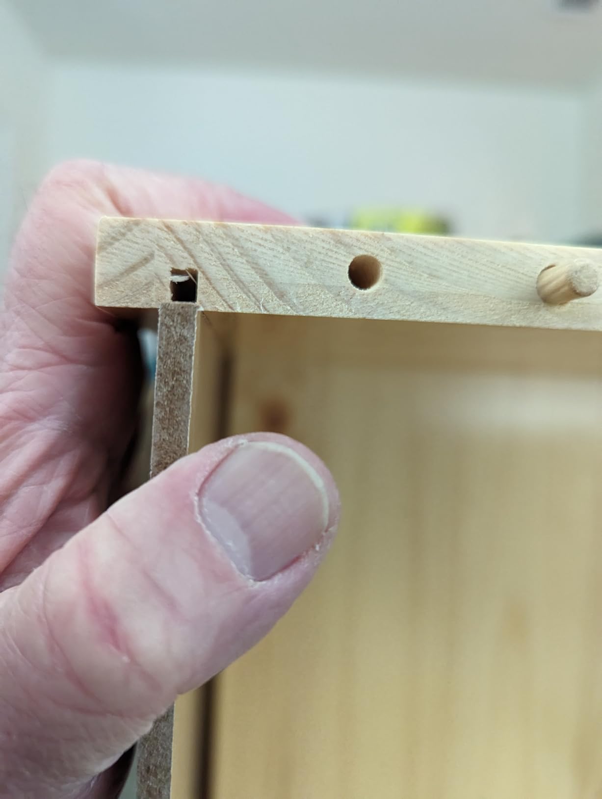 Can't install bottom back panel because the groove in the bottom plank isn't wide enough