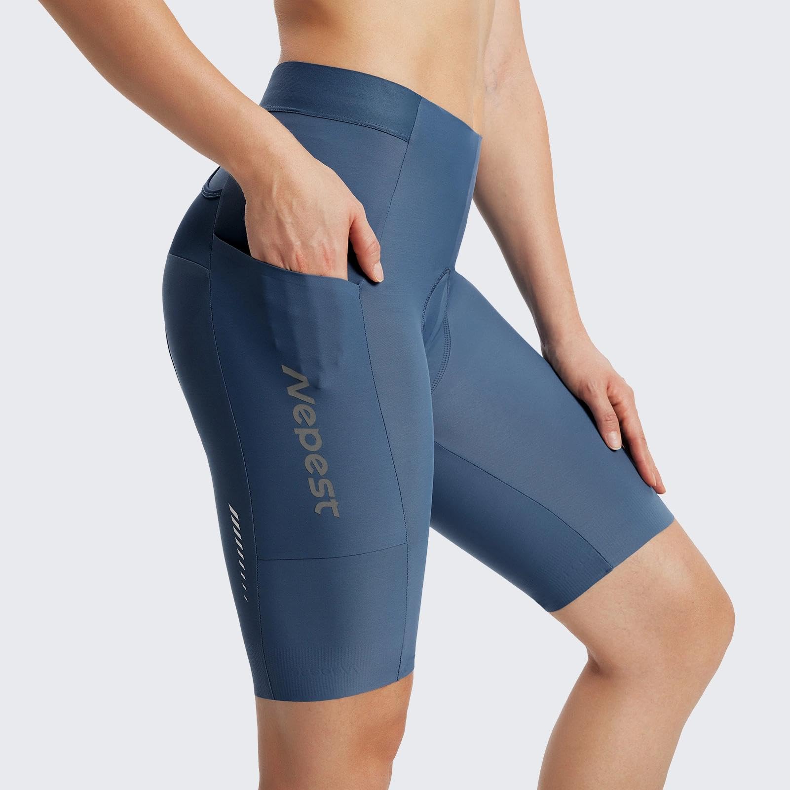 Nepest Pantalones cortos de ciclismo 4D para mujer, con acolchado y bolsillos, UPF 50+, reflectantes, transpirables