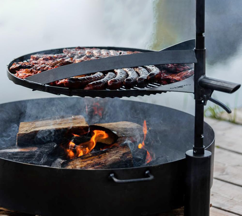 CookKing Feuerschale Montana X 60 mit Holzlager und Zubehör aus Rohstahl Ø 60 cm handgeschweißt wetterfest inklusive Grillrost und Befestigungsmast für Garten Terrasse Outdoor