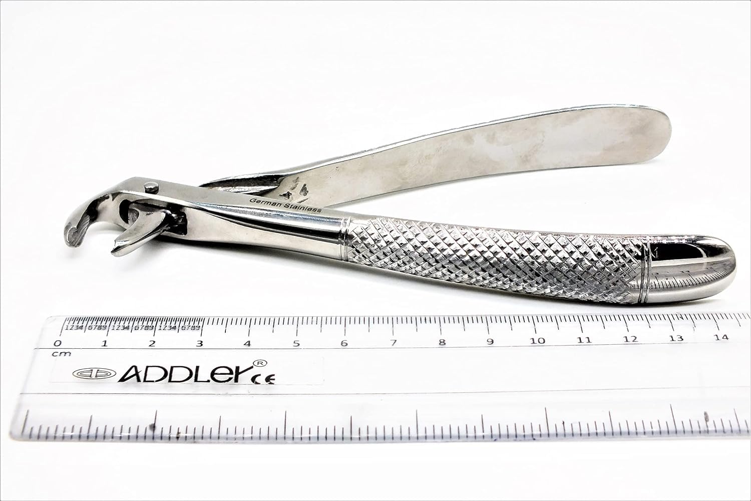 DENTAL EXTRACTION LOWER ROOT FORCEP NO. 73 SERRETED HANDLE. LIFE TIME ANTI RUSTING WARRANTY.