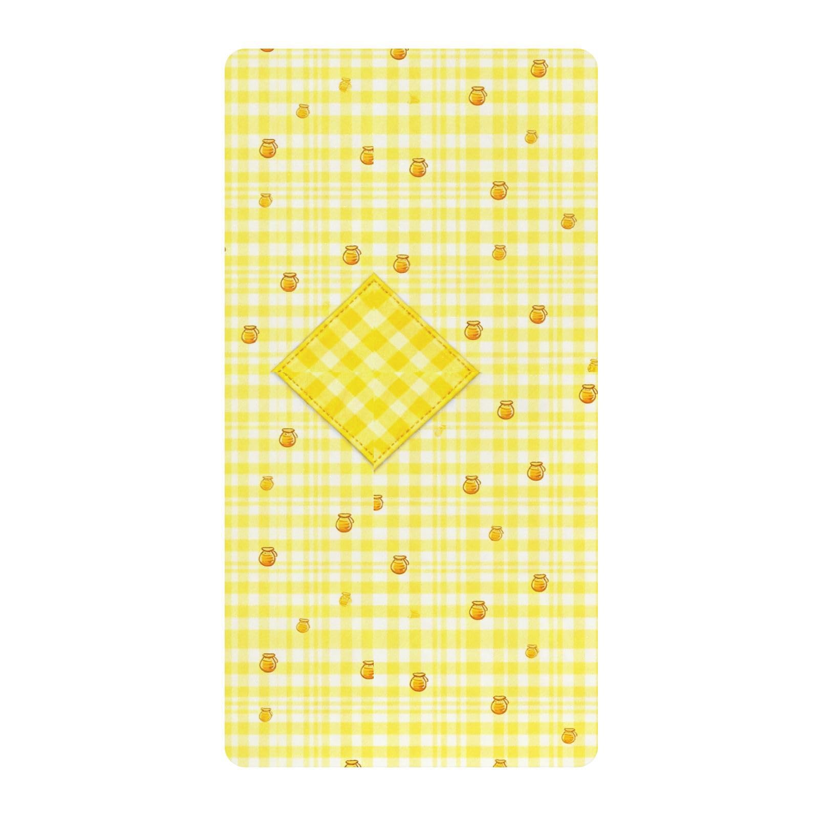 Drap de berceau à carreaux pour créer un cocon doux dans la chambre