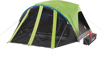 Coleman Carlsbad Dark Room tent, 4-6 person, with a dark interior and a front screened porch, set up outdoors in a natural setting.