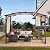 Sunjoy Outdoor Pergola 9.5 x 11 ft. Steel Arched Pergola with Adjustable Canopy for Patio, Backyard and Garden Activities, Tan & Brown