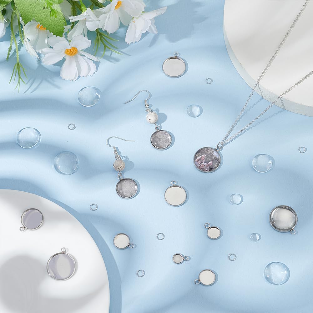 UNICRAFTALE 200 pezzi 100 set di ciondoli piatti rotondi cabochon a cupola, 12 mm, vassoio in acciaio inox, con cabochon in vetro, per la creazione di gioielli fai da te, Metallo non