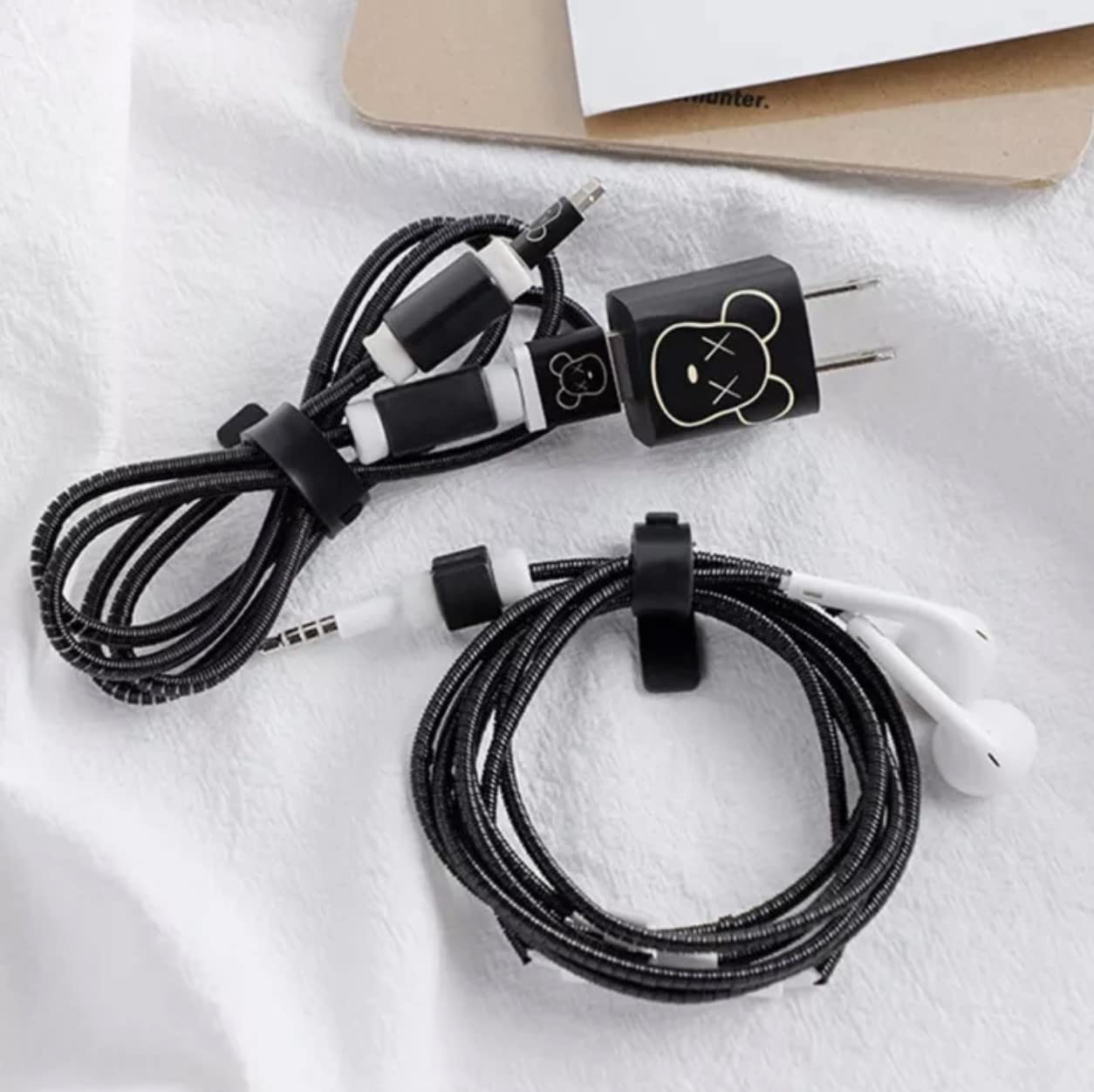 Careflection 6-in-1 Multi Combo Spiral USB Cable Protectors + Earphones Winder + Sticker + Cable Clips + Earphone Jack Clip for Old 5W Apple iPhone iPad Charger (KAWS Bearbrick Black)