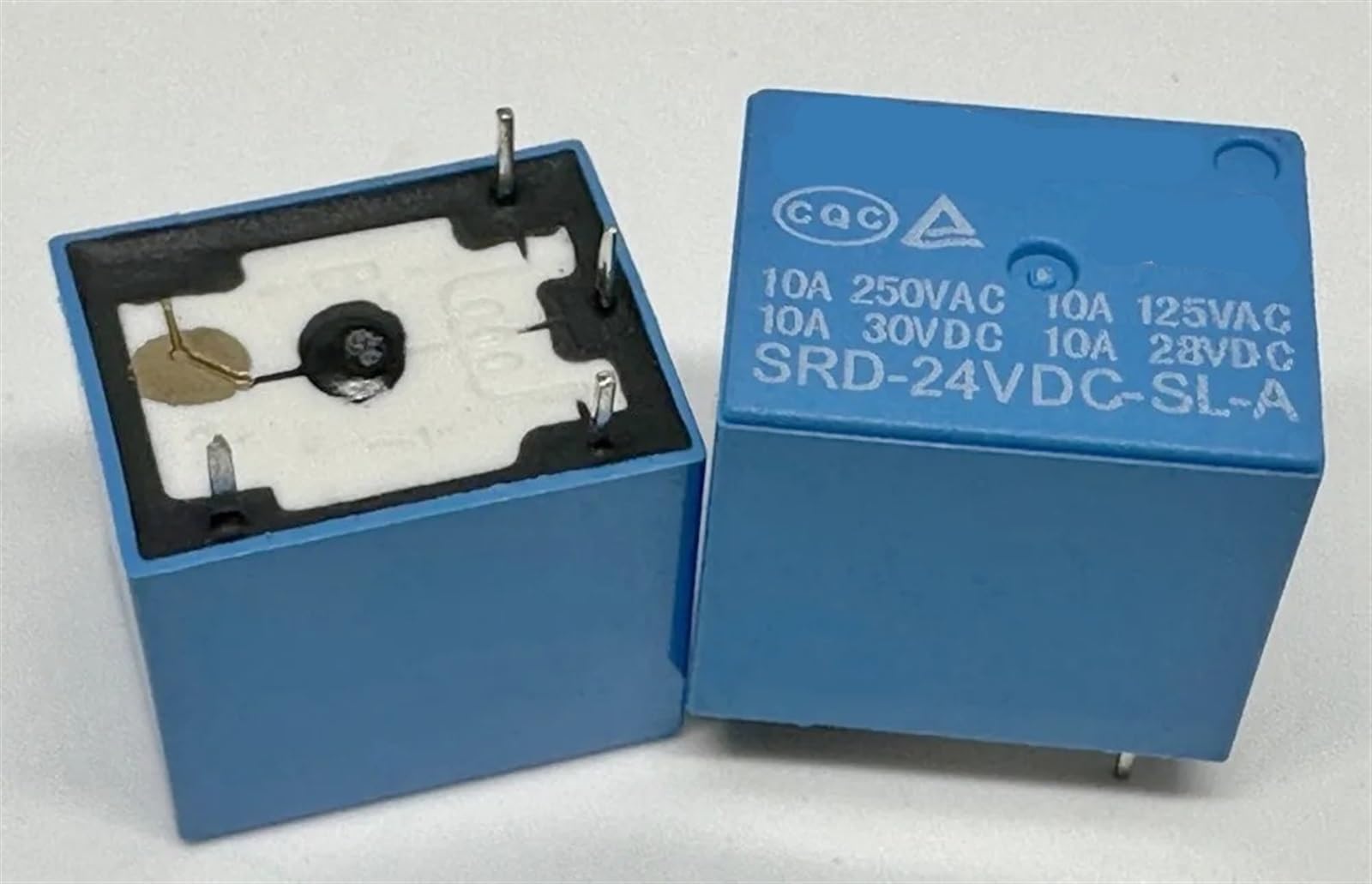 Relé SRD-12VDC-SL-A1 15A de 4 pines y componentes T73-1A para control electrónico 3