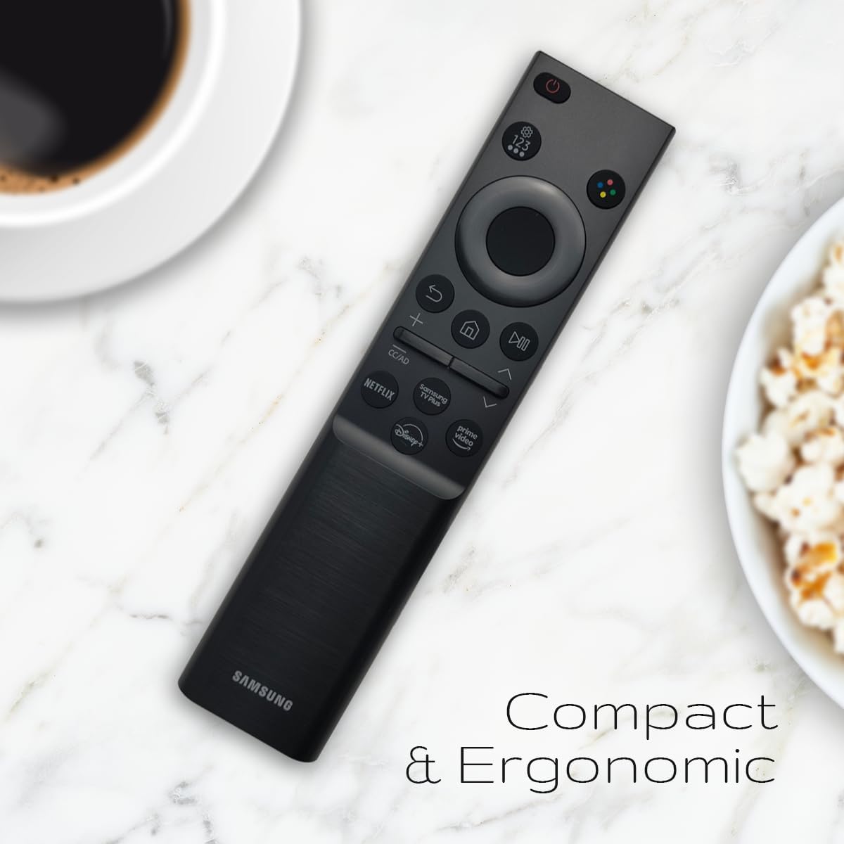 Image of the Ceybo BN59-01388A remote control being held in a hand, demonstrating its ergonomic design and button layout.