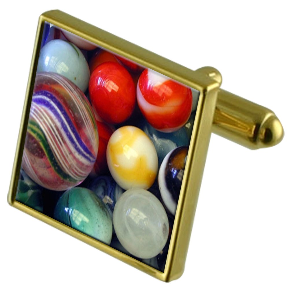 Jugando canicas de Color Oro-Tono Gemelos en la Bolsa