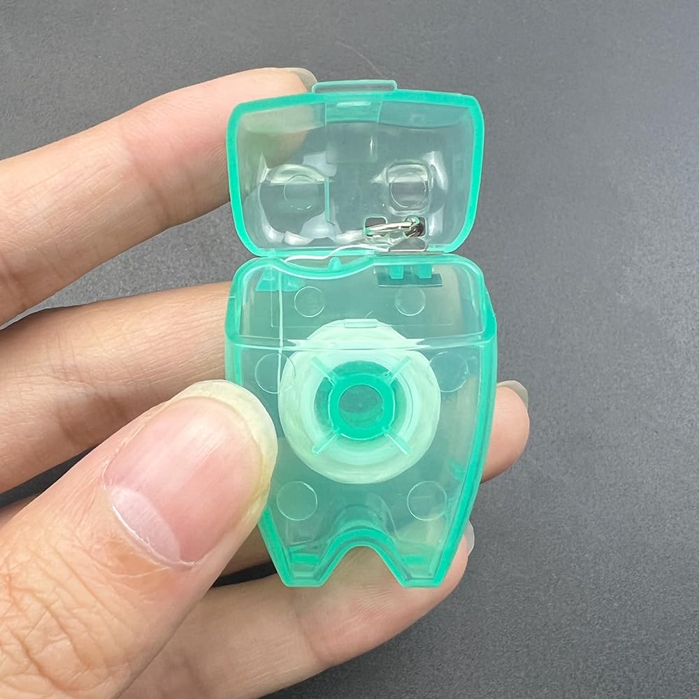 Set di 100 portachiavi portatili per la pulizia dei denti alla menta, a forma di dente, design piatto, rotolo di filo interdentale, per la pulizia orale