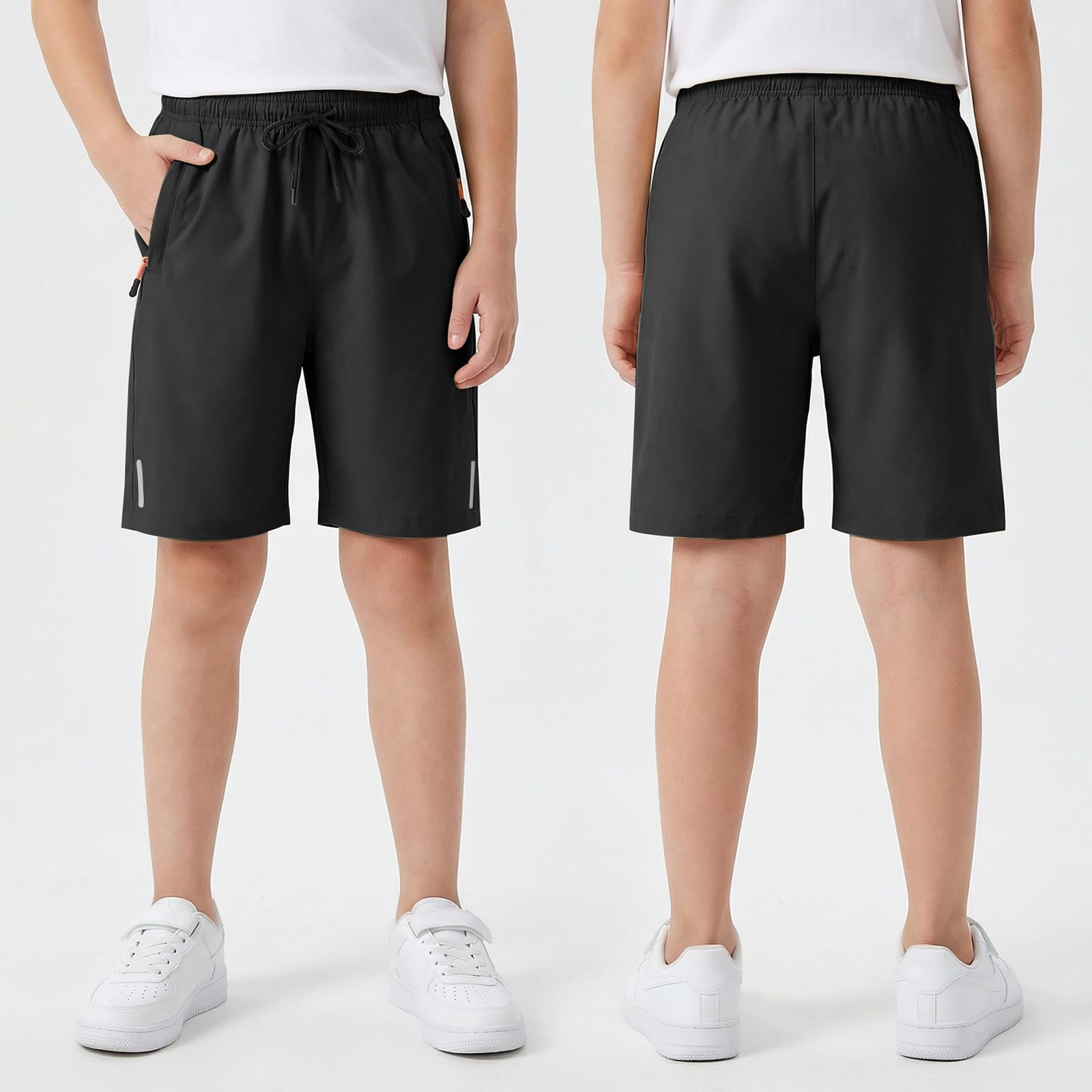 Shorts Niños, Secado Rápido Pantalones Cortos de Deporte con Tiras Reflectantes, Transpirable Pantalón Cortos con Bolsillos y Cremallera Escuela Fútbol para Infantil 6-13 Años